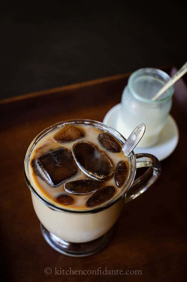 A freshly stirred glass of Vietnamese Iced Coffee.