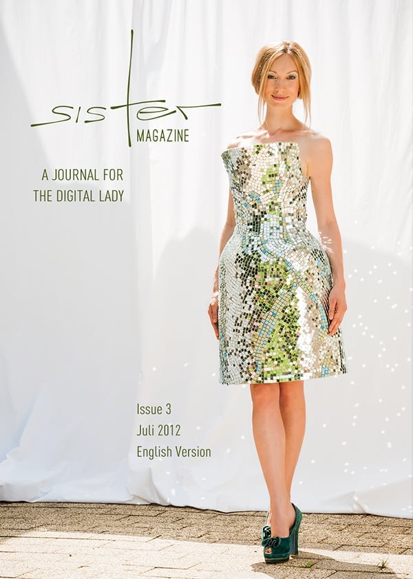 The cover of Sister Magazine, Issue 3. A blonde woman stands in green heels and a green mirrored dress in front of a white background.