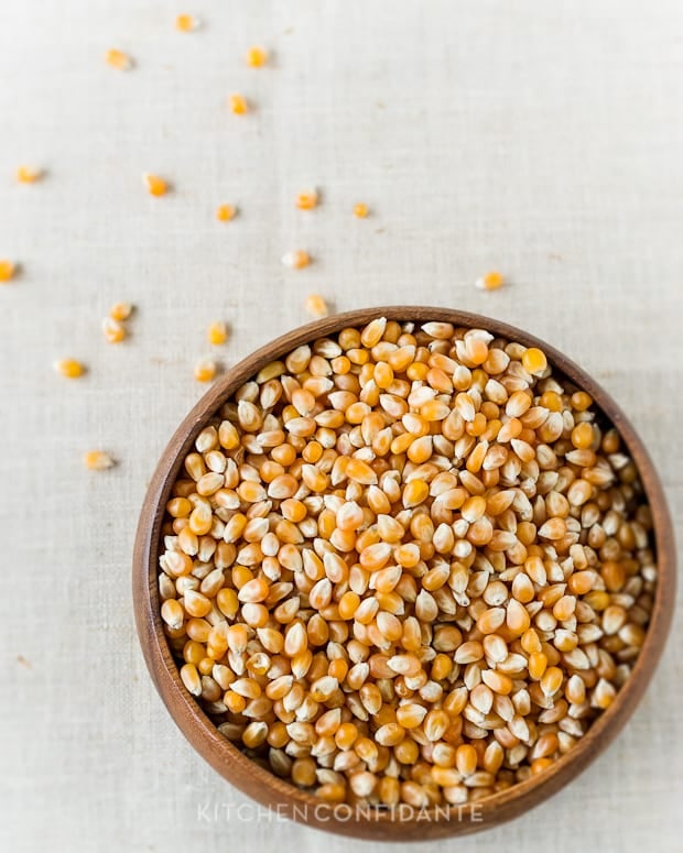 Popcorn kernels in a bowl.