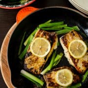 Garlic & Herb Halibut with Scallions | Kitchen Confidante | In Pan