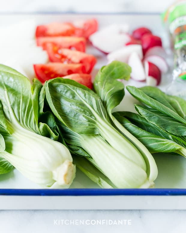 Baby bok choy on a countertop. 