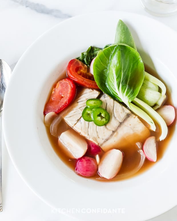 Filipino Fish Soup served in a white bowl.