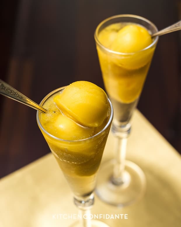 Sparkling Mango Sorbet Floats with scoops of mango sorbet.