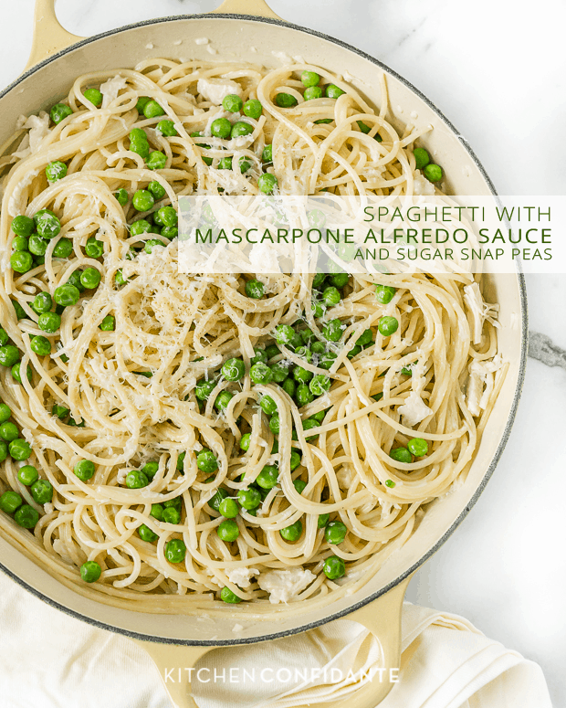 Spaghetti with Mascarpone Alfredo Sauce and Sugar Snap Peas in a large Dutch oven dish.