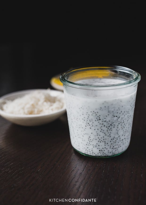 A glass filled with coconut chia pudding.