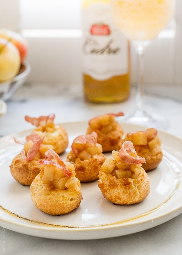 Apple Cheddar Gougères with Crispy Prosciutto on a serving platter.