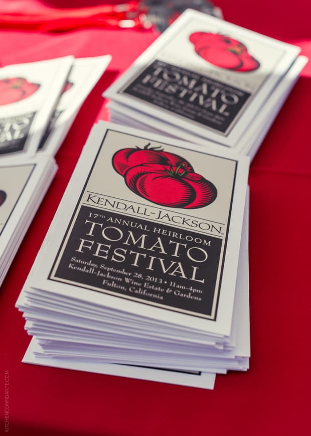 A stack of brochures for the 2013 Kendall-Jackson Heirloom Tomato Festival / Fire Roasted Tomato Jam Crostini