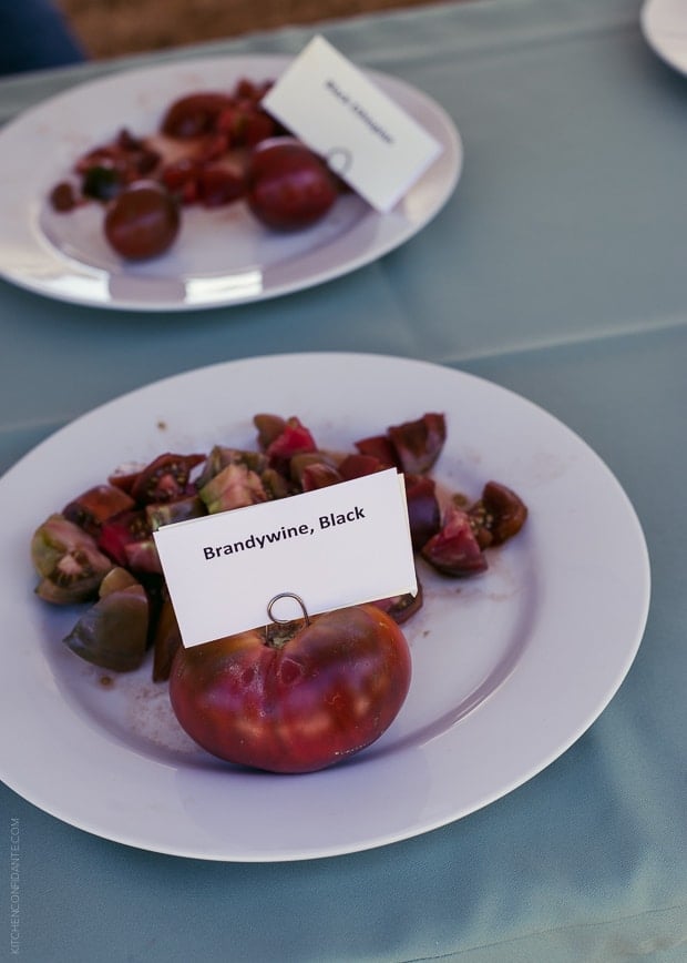 A Brandywine Tomato - one whole tomato beside lots of bite sized pieces for tasting.