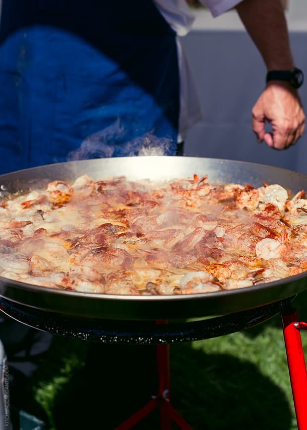 Shrimp for Paella being cooked over an open flame.