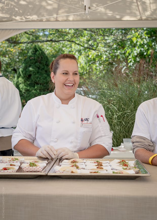 Chef standing in front of a platter of appetizers made by local Sonoma restaurants.