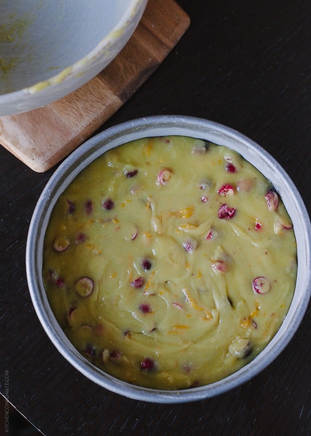 Cranberry Orange Olive Oil Cake batter in a tin ready to bake. 