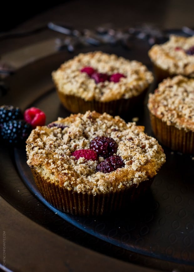 Mini Mixed Berry Pecan Coffee Cakes topped with raspberries and blackberries.