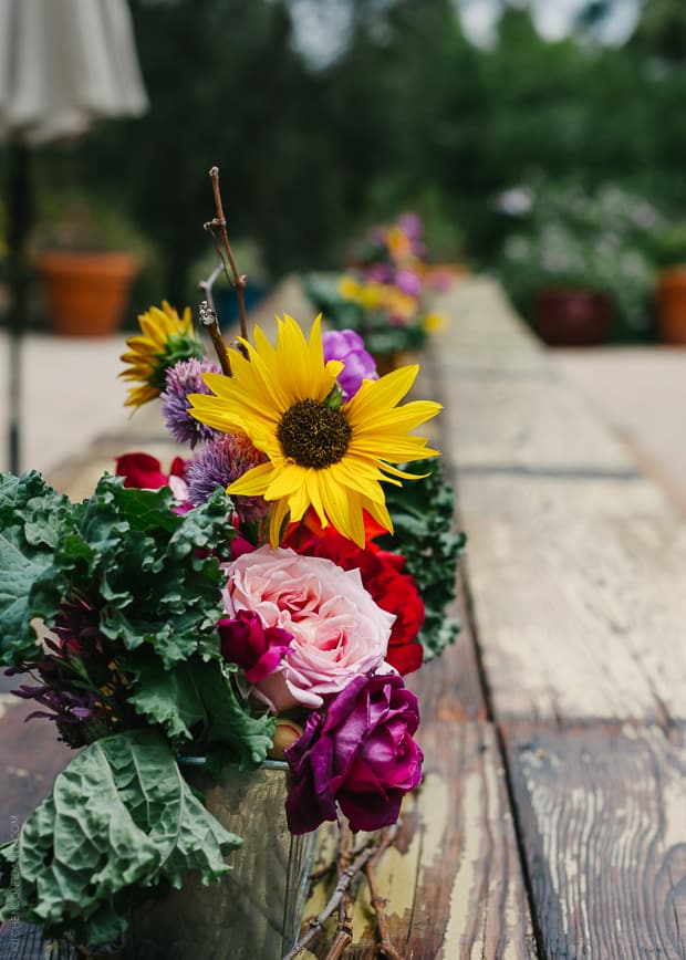 Flower centerpieces at the Big Traveling Potluck 2014.