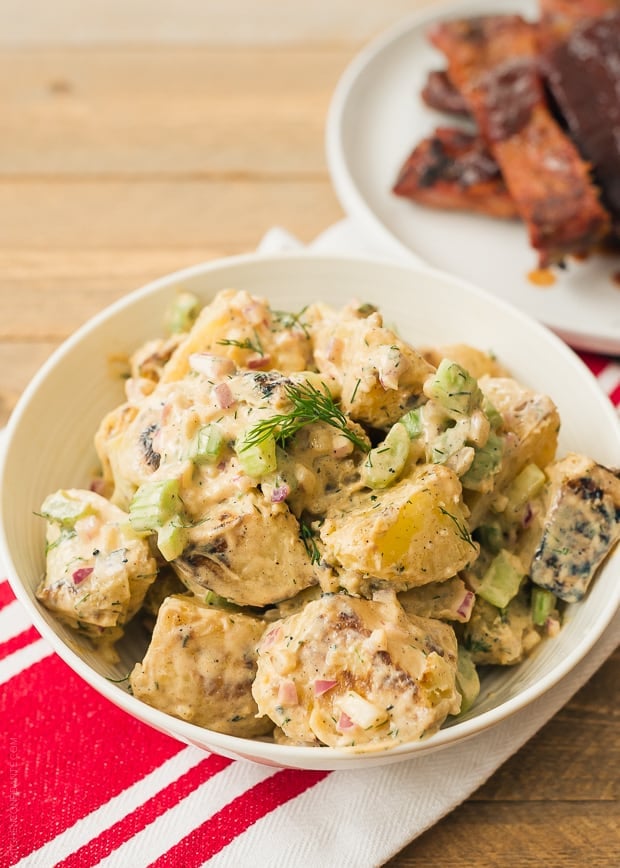 A bowl filled with Buffalo Ranch Grilled Potato Salad.