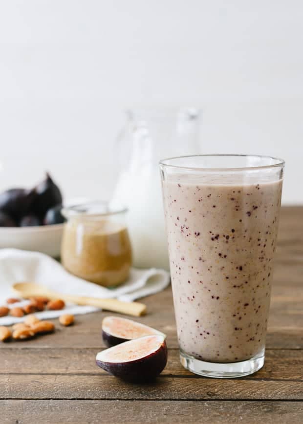 This sweet and creamy Fig and Almond Butter Smoothie is super nourishing after a workout - but the truth is, it tastes decadent enough to be a dessert.