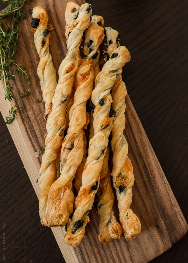 Olive Cheese Straws on a serving board.