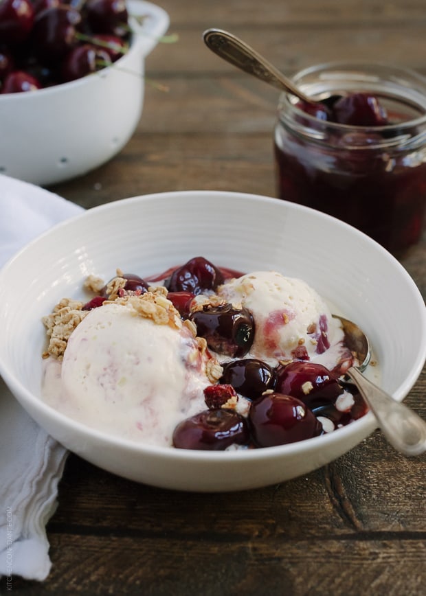 Fresh Cherry Wine Sauce with Ice Cream in a white bowl.