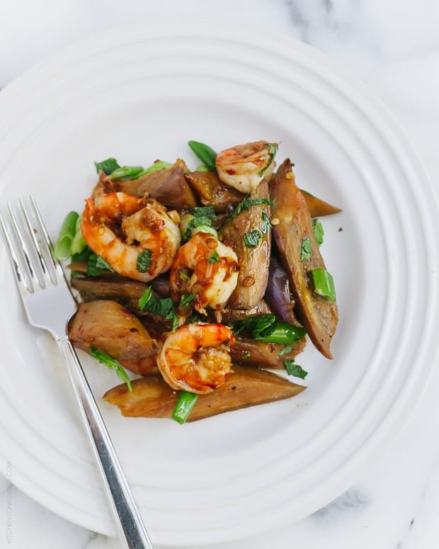 Sambal Glazed Eggplant and Shrimp on a white plate.