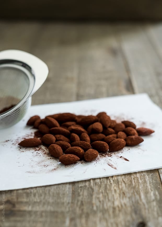 Four Layer Pudding Cups | www.kitchenconfidante.com | Cocoa dusted almonds.