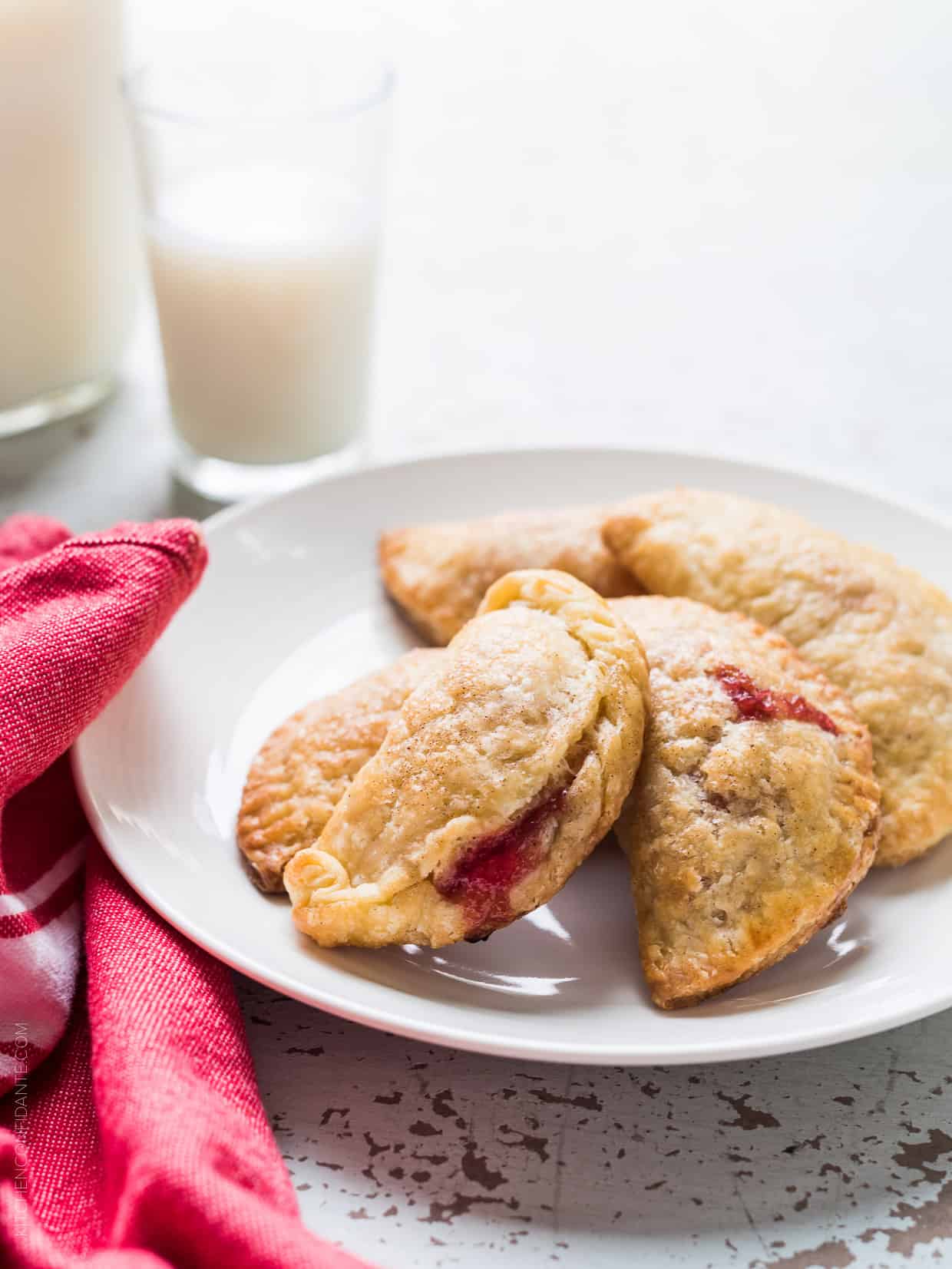 Plate with several rhubarb empanadas on it.