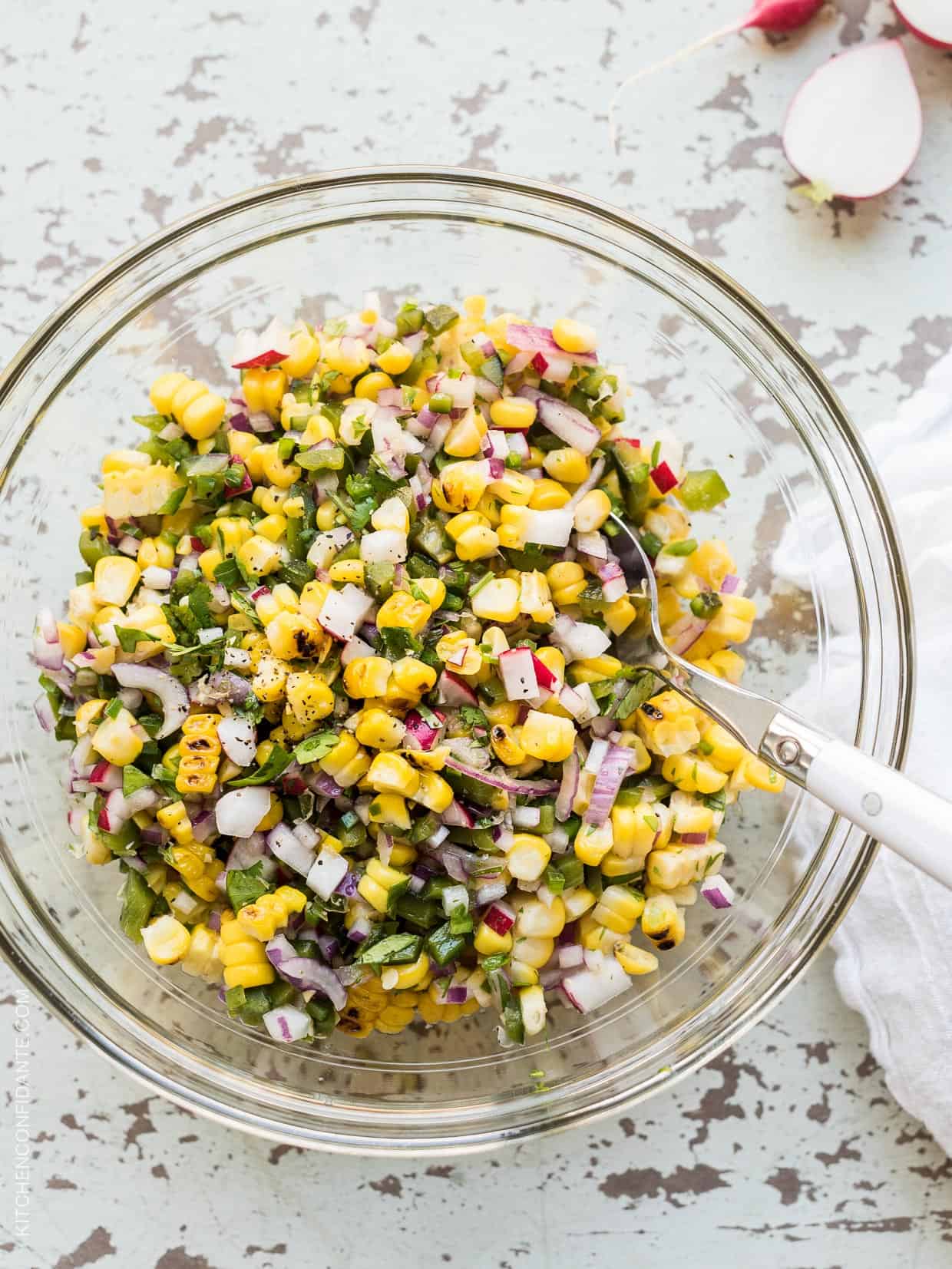 Grilled Corn and Poblano Salad in a glass bowl.