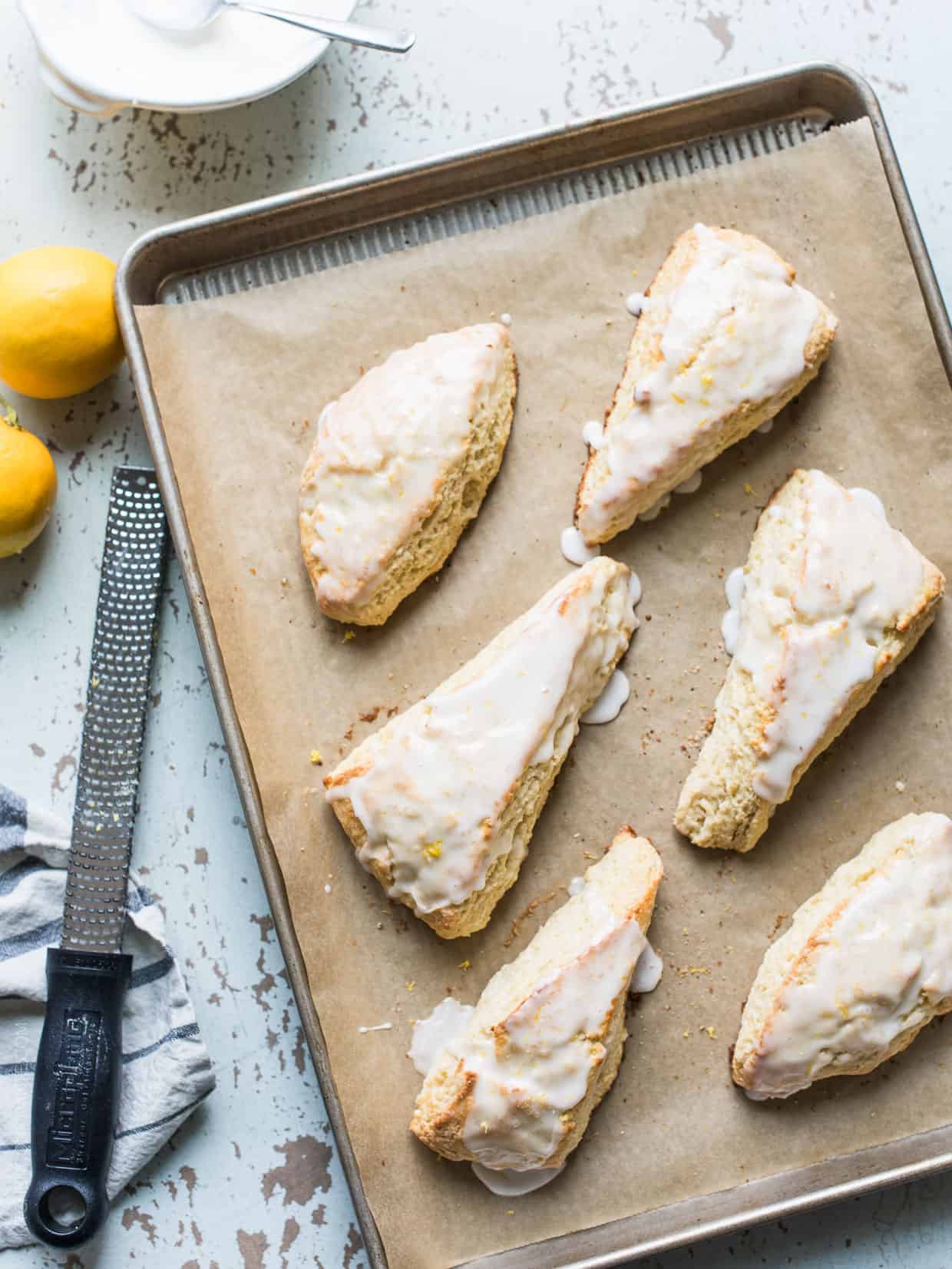 This recipe for Meyer Lemon Ricotta Scones will brighten up any winter morning with its moist, tender crumb and sweet lemon glaze.