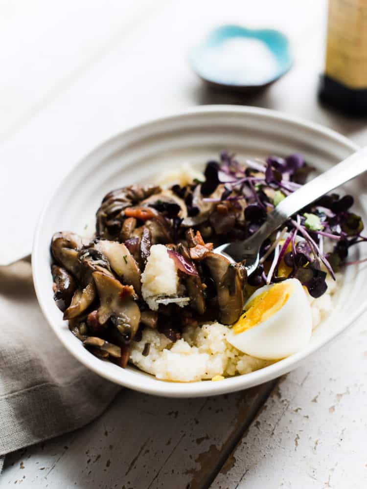 When you're craving something hearty in the morning, a simple, comforting Mushroom Polenta Breakfast Bowl bursting with mushrooms, onions, pancetta and an egg is all you need.