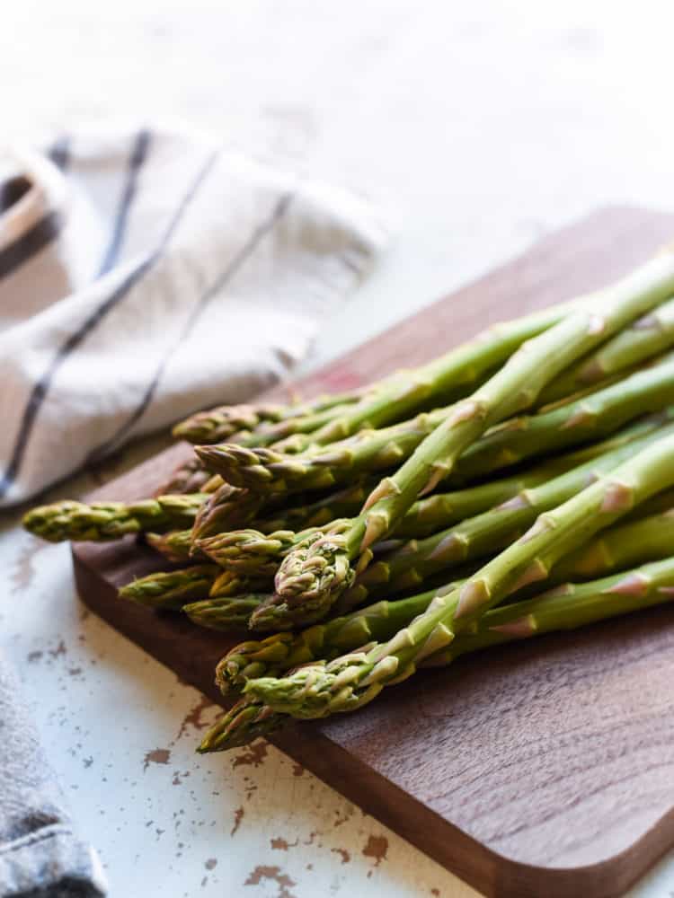Hot Chili Blistered Asparagus with Sriracha Aioli is simply addictive! They're sure to please a crowd, whether served as an appetizer or a spicy snack