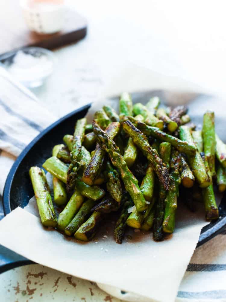 Hot Chili Blistered Asparagus with Sriracha Aioli is simply addictive! They're sure to please a crowd, whether served as an appetizer or a spicy snack