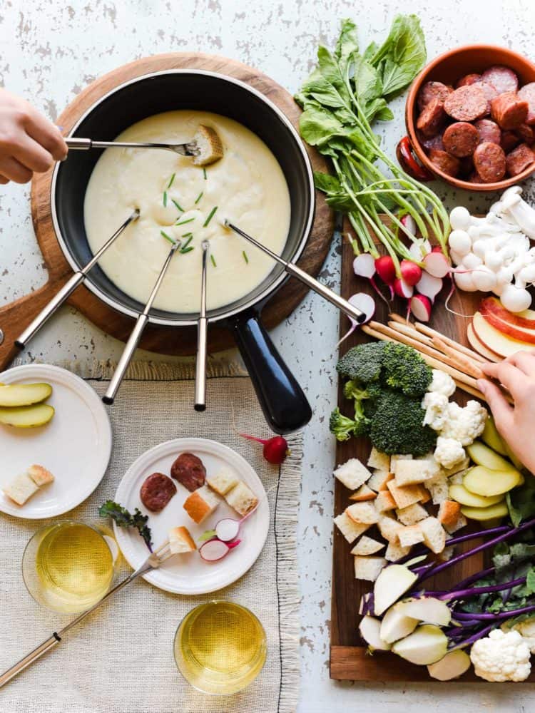 Put the fun in fondue with one of the easiest and most entertaining forms of hosting! Here are some tips to take a dip (literally and figuratively!) in how to host a fondue party made with @EmmiSwissUSA.