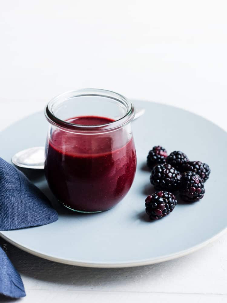 Transform blackberries into a bold blackberry balsamic dressing! It's perfect for spring salads!