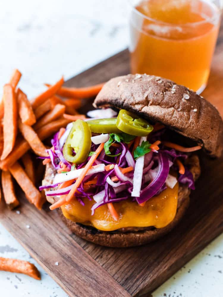 Get ready for your new favorite burger - Filipino-style Adobo Burgers are marinated for extra flavor! Try it topped with a red cabbage and jicama slaw for the ultimate burger bite!