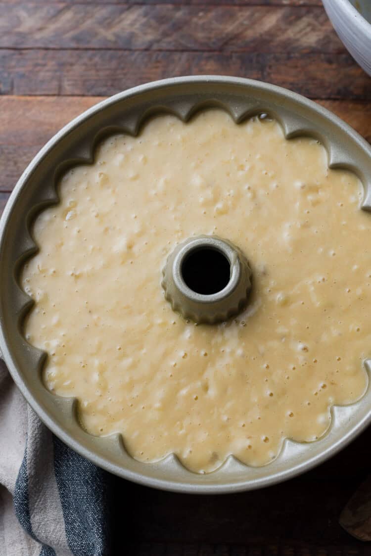 Batter for banana pineapple cake in a Bundt pan, ready for the oven.
