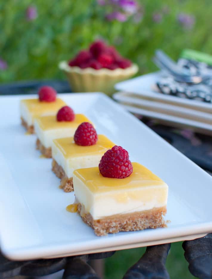 No Bake Lemon Curd Cheesecake Bars are cool and creamy bites of lemon loveliness.