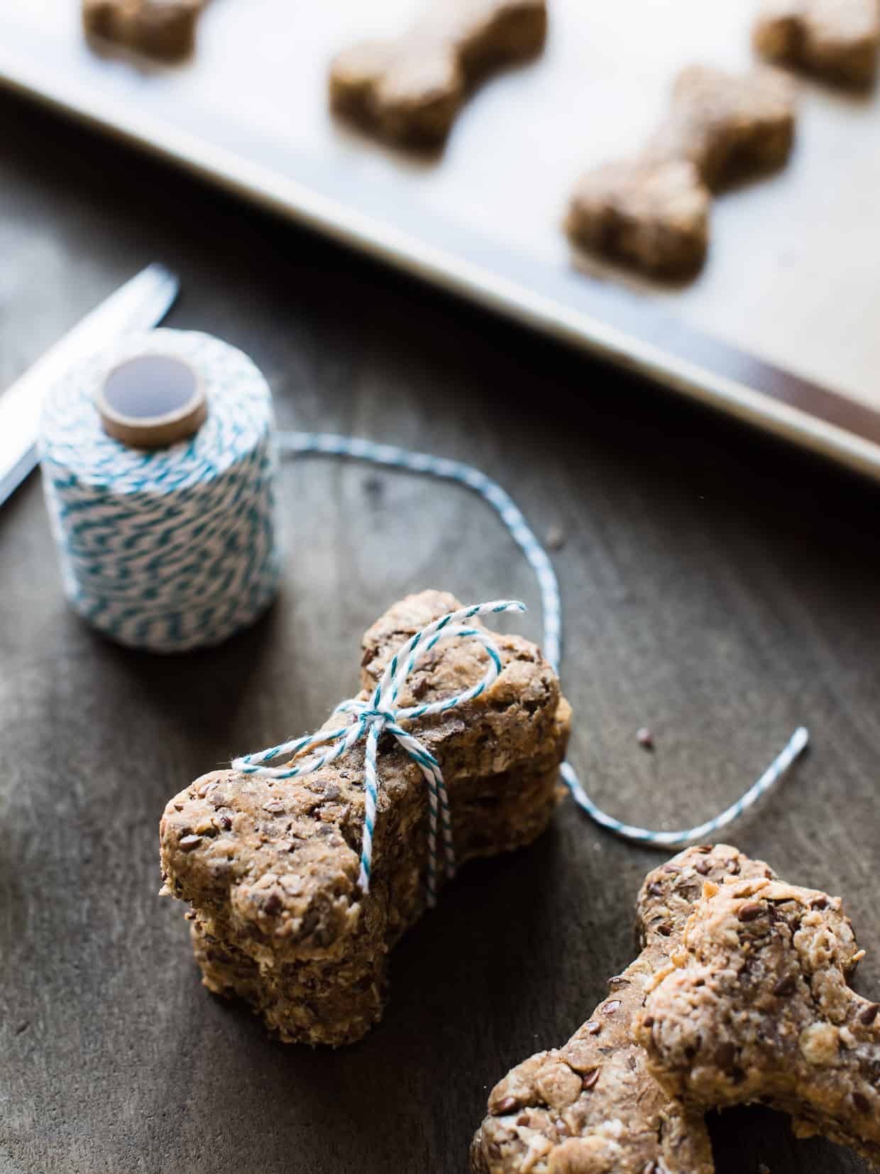 Packaging homemade dog biscuits with twine.