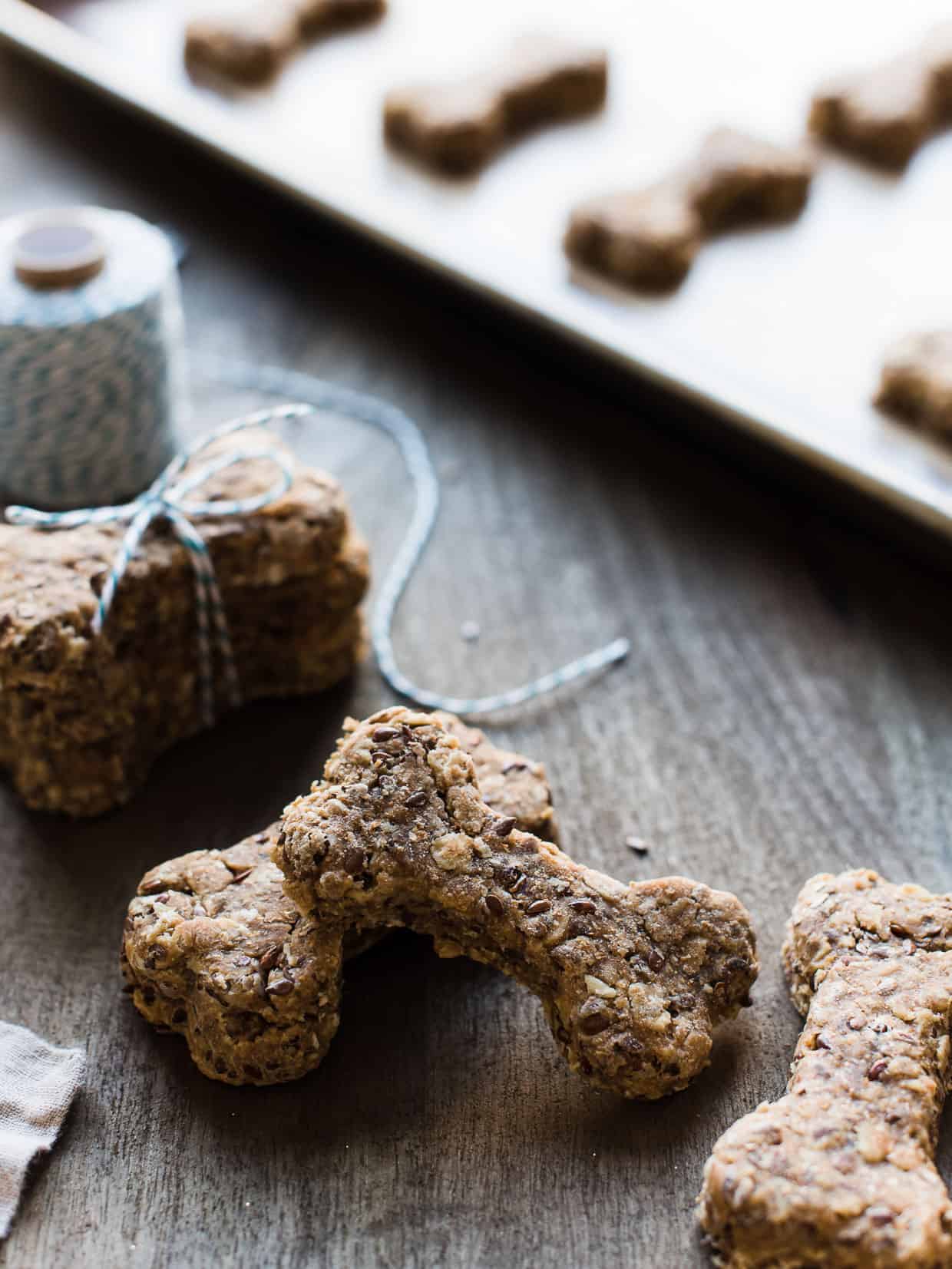 Homemade dog biscuits stacked on table