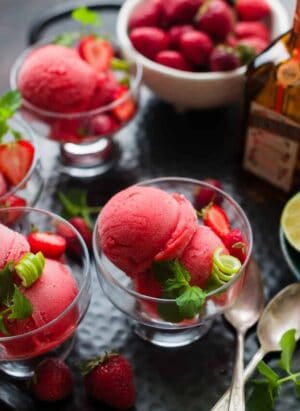 Strawberry Cointreau Sorbet in glass dessert dishes.