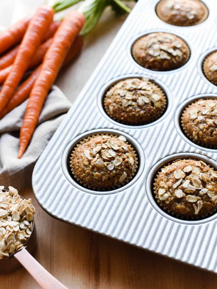 Carrot Oat Muffins in a muffin pan.