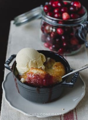 Cranberry Rhubarb Cobbler baked in a mini Dutch oven.