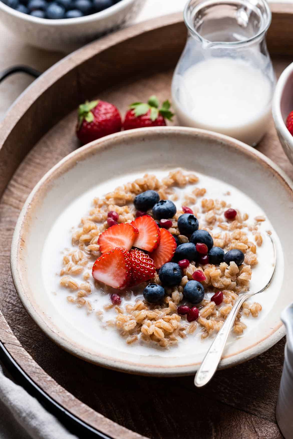 Maple Cinnamon Breakfast Farro with blueberries in a bowl.