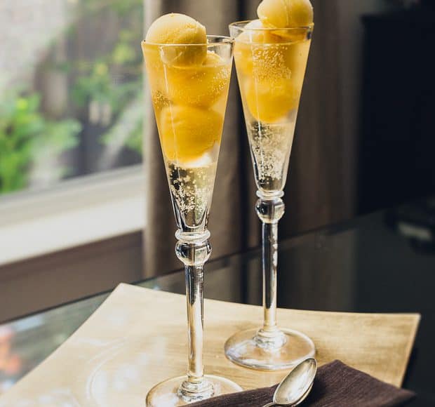 Two sparkling mango sorbet floats.