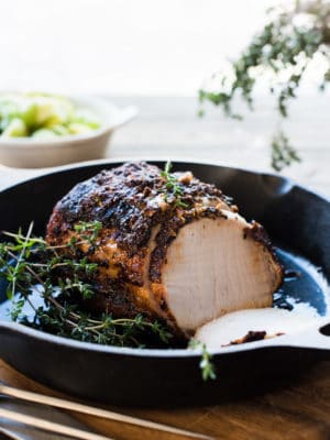 Roast Pork Loin with Balsamic Dijon & Thyme in a cast iron skillet