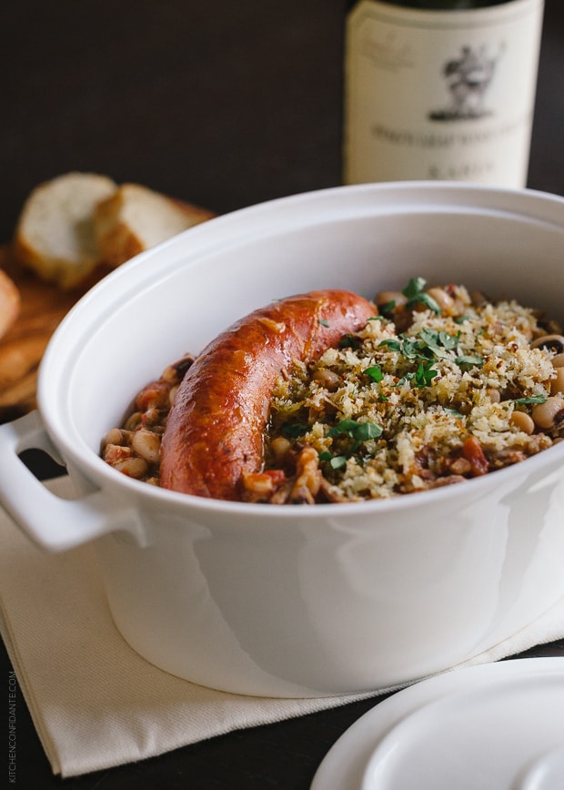 Black Eyed Pea Cassoulet with sausage in a serving dish.
