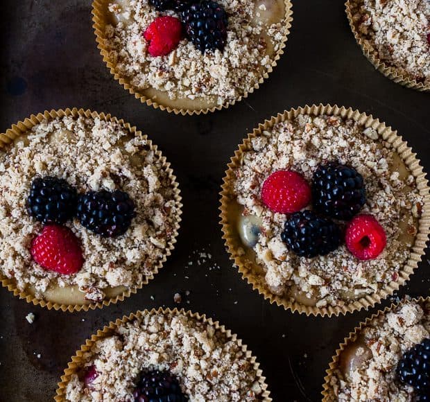 Mini Mixed Berry Pecan Coffee Cakes topped with raspberries and blackberries.