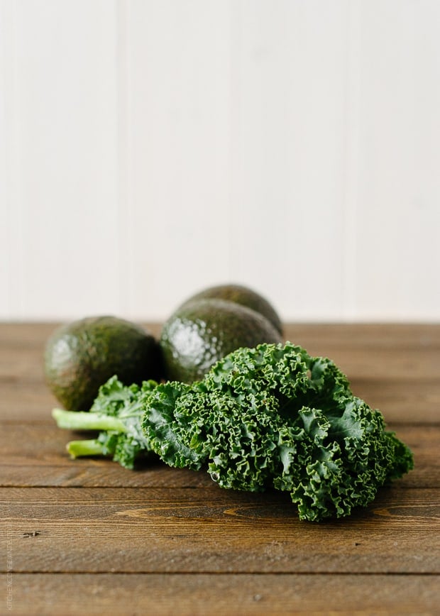 Avocado Kale Superfood Smoothie ingredients: avocados and kale leaves
