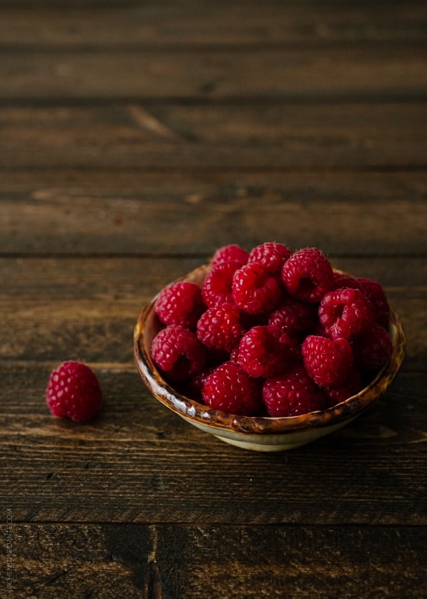 A bowl of fresh raspberries.