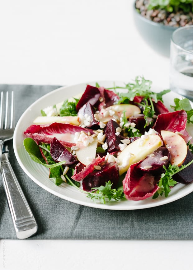 Endive leaves tossed in a plate of salad.