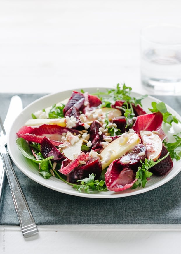 A large plate filled with Apple Beet Salad, Endive and Baby Greens.