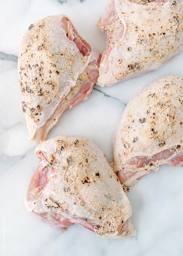 Raw chicken with seasoning.