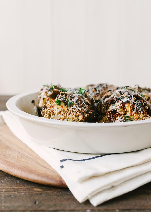 Toasted Quinoa Stuffed Artichokes in a serving dish.